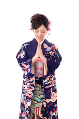 attractive asian woman wearing kimono isolated on white background