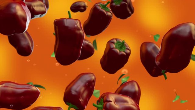 Red bell peppers falling in slow motion