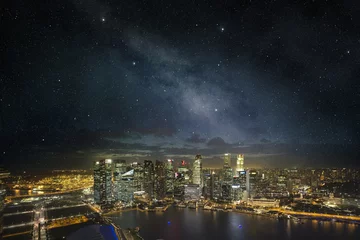 Fotobehang singapore skyline under a starry night sky © Paulista