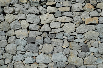 natural stone wall background - rubble wall