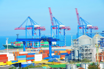 Naklejka premium Port cargo crane, ship and container