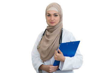 Closeup portrait of friendly, smiling confident muslim female doctor holding folder.