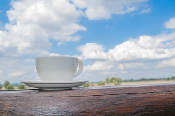 Close up white cup of Coffee, latte on the wooden table