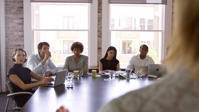 Businesspeople Listen To Boardroom Presentation Shot On R3D