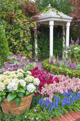 pavilion in beautiful flower garden