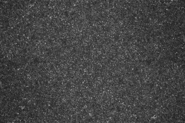 Fototapeta premium Asphalt background texture with some fine grain in it background