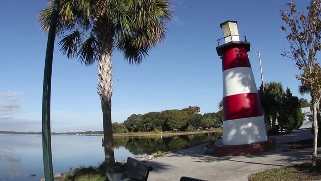 Mount Dora Lighthouse Park in the morning , Lake Dora, Central Florida camera pan