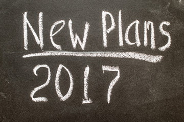 Fototapeta premium New Plan 2017 handwritten with white chalk on a blackboard 