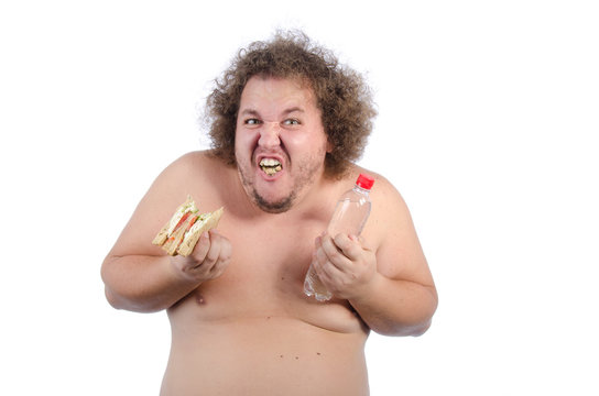 Hungry fat guy with a sandwich.