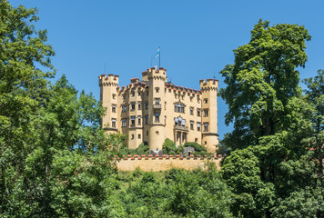 Fototapeta na wymiar Hohenschwangau Castle close to Neuschwanstein castle, Romanesque Revival palace. Hohenschwangau, Fussen, Bavaria, Germany.