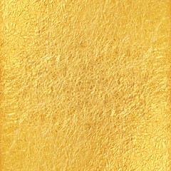 Shiny yellow leaf gold foil texture background