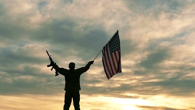 
Soldier lift up American Flag and automatic rifle .Slow Motion. 
