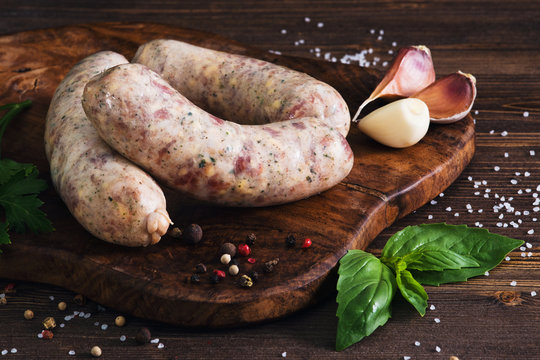 Raw sausages with garlic and parsley