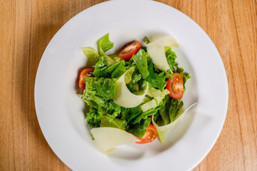 Vegetable salad on a white plate