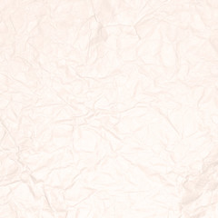 Crumpled light brown paper texture or paper background for design with copy space for text or image.