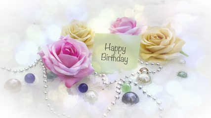 A message on paper, roses on Snow, text on paper stick, note