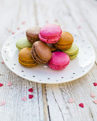 Colorful and delicious macaroons, French cakes. 