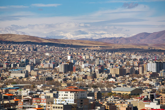 Urmia city aerial view with mountains in the north-west of Iran