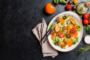 Fresh salad with persimmon