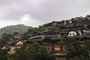 Fototapeta na wymiar traditional chinese village on hillside