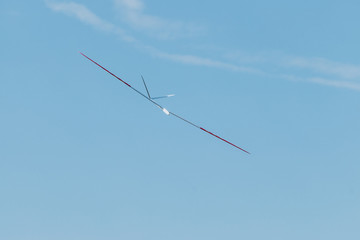RC soaring plane on blue sky