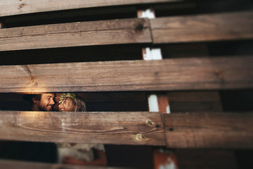 Newlyweds behind the fence