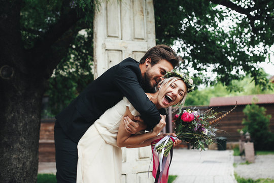 Groom and bride with flowers