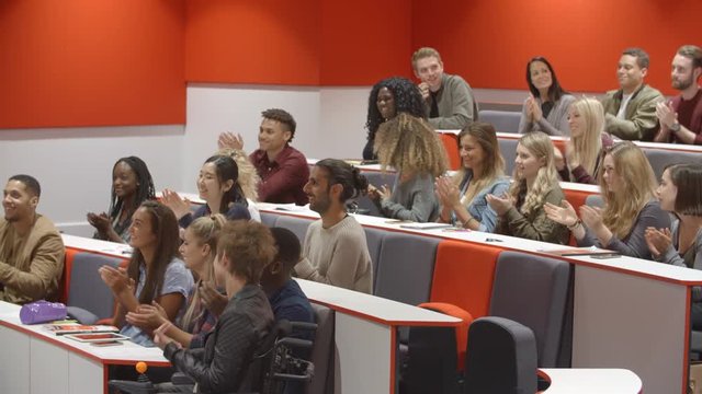 University Students Applauding At The End Of A Lecture