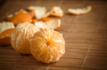 tangerines in snow on a wooden table, new year, a still life