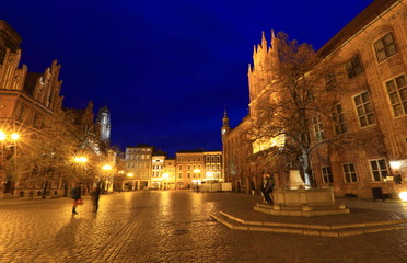 Fototapeta na wymiar Old Town Market Square by night in Torun, Poland, historic city centre 