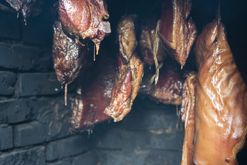 View of a smoking meat in the smokehouse.