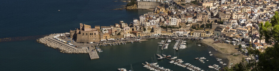 aerial view of castle and marina area
