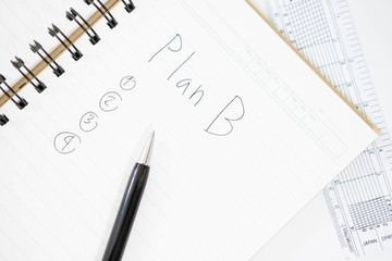 Plan B written on a blank notepad