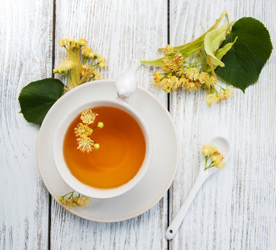 cup of herbal tea with linden flowers