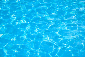 Blue and bright water in swimming pool