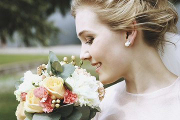 beautiful bride with bouquets  