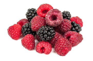 heap of raspberries and blackberries