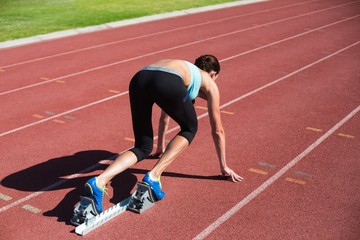 Female athlete ready to run