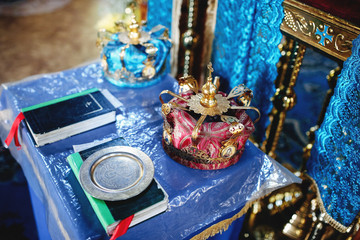 Bibles and crowns for the ceremony in the church