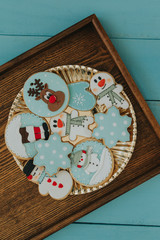 Fototapeta na wymiar Tasty cookies for Christmas in blue tones