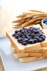 slice of bread with jam blueberry
