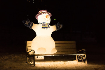 The Snowman on the bench.