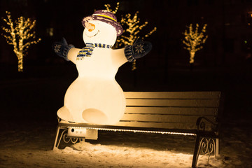 The Snowman on the bench.