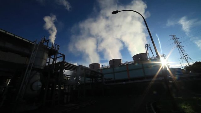 Thermal power plant at sunset