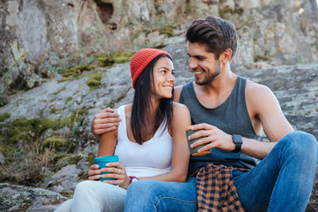 Happy couple on rock