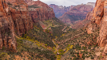 Naklejka premium Highway among the rocks. Amazing mountain landscape. Breathtaking view of the canyon. Zion National Park, Utah, USA
