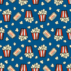 Striped box of popcorn and a movie ticket. Seamless vector pattern on blue background. - obrazy, fototapety, plakaty