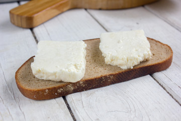 Traditional indian cheese panneer with pieces of bread