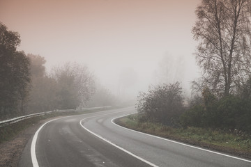 Rural foggy road background photo