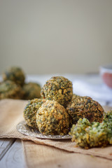 Chickpea falafel balls on metal plate. Falafel is vegetarian dish.